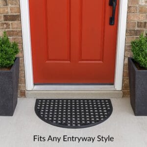 Half-moon rubber doormat at red entry door outdoor setting