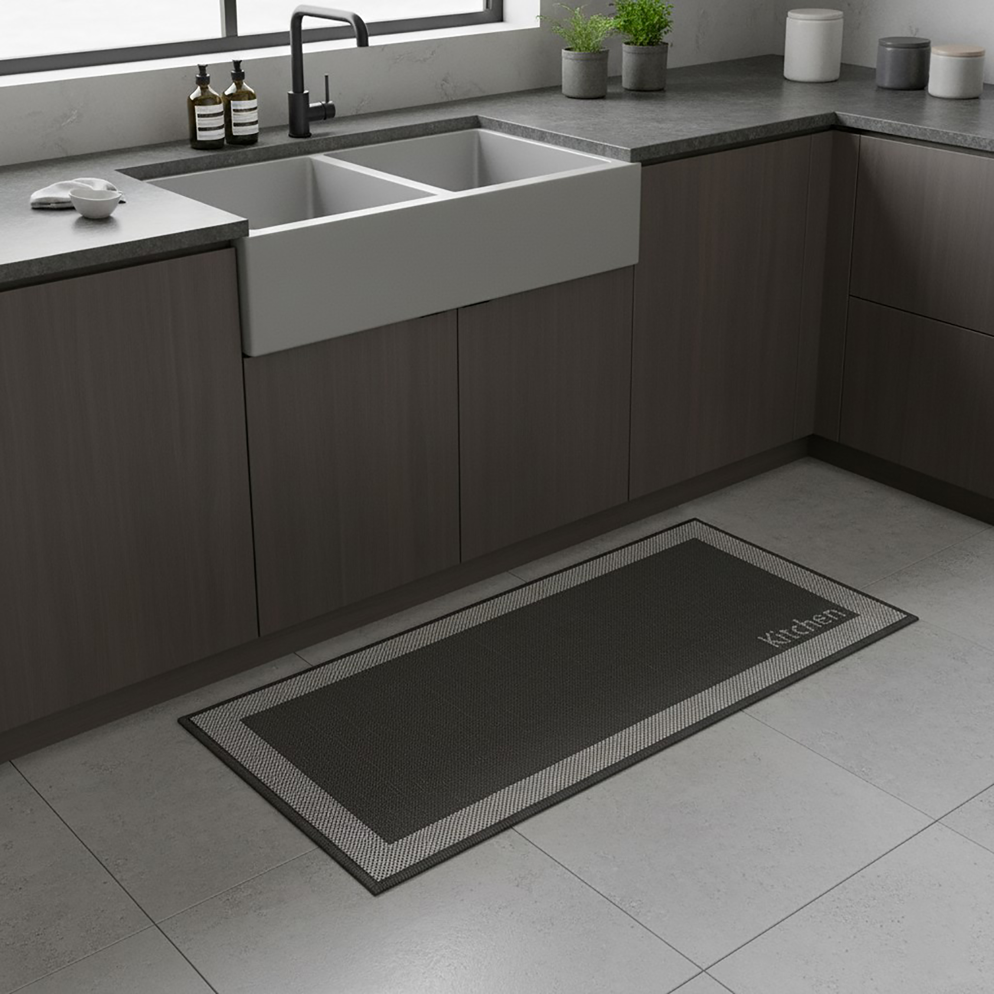 Kitchen black mat with border placed in front of modern sink
