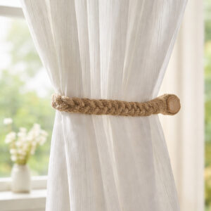Jute curtain tieback installed on sheer curtain panel