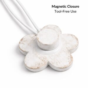 Back view of resin flower tieback showing magnetic closure