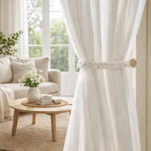 Tieback holding light fabric curtains in living room