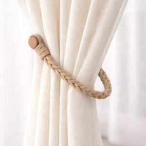 Tieback holding thicker curtains in place