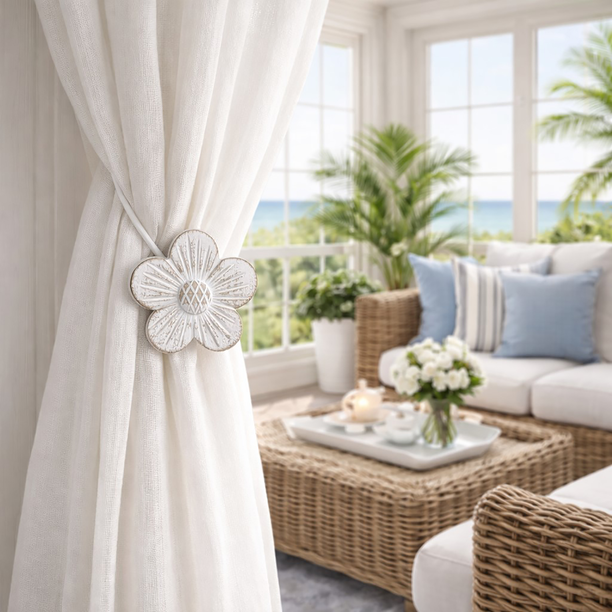 Decorative resin flower curtain tieback styled in coastal living room