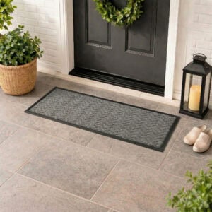 Light gray runner doormat at front door covered porch lifestyle