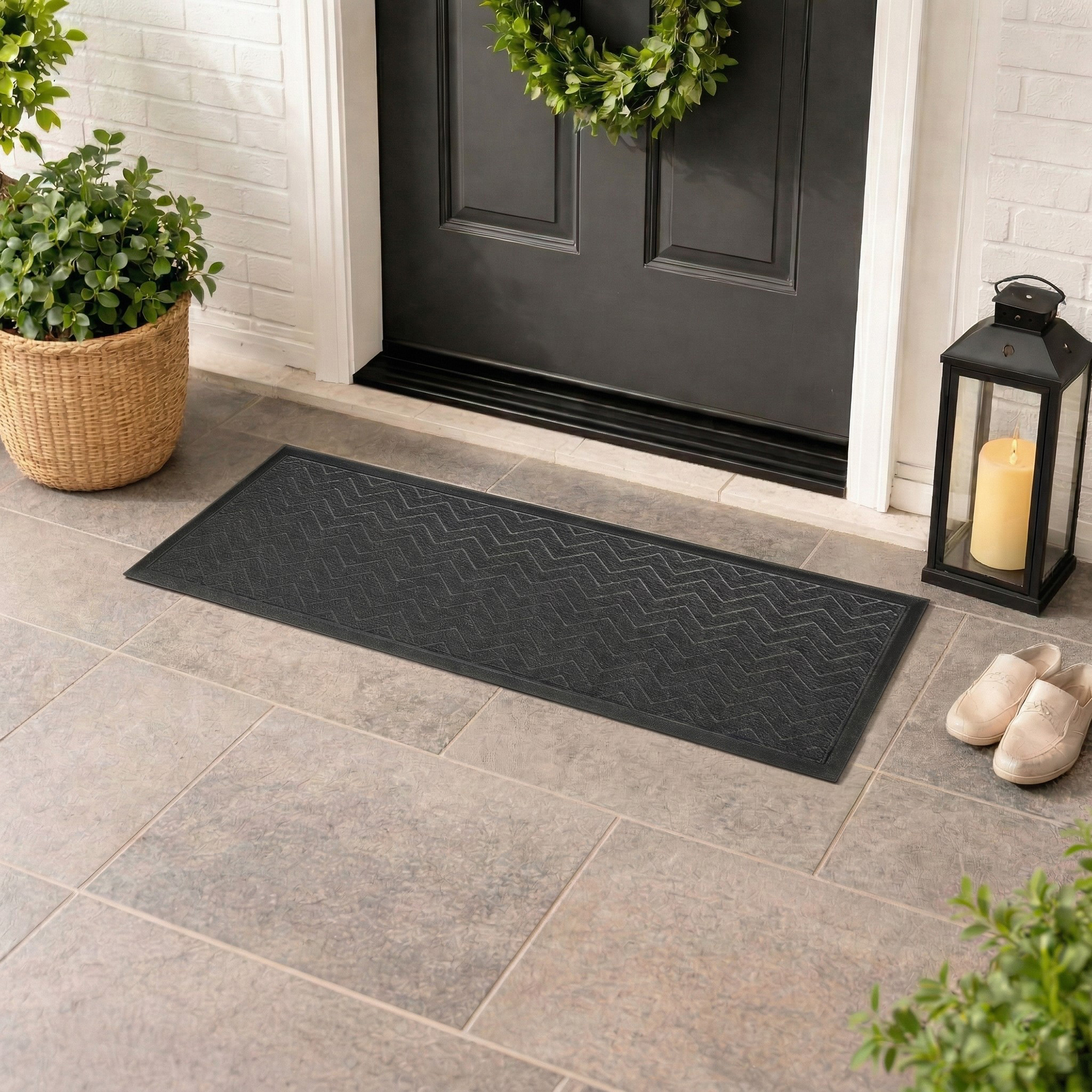 Dark gray runner doormat at front door covered porch lifestyle