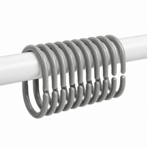 Glossy gray curtain rings grouped on white rod showing full set alignment