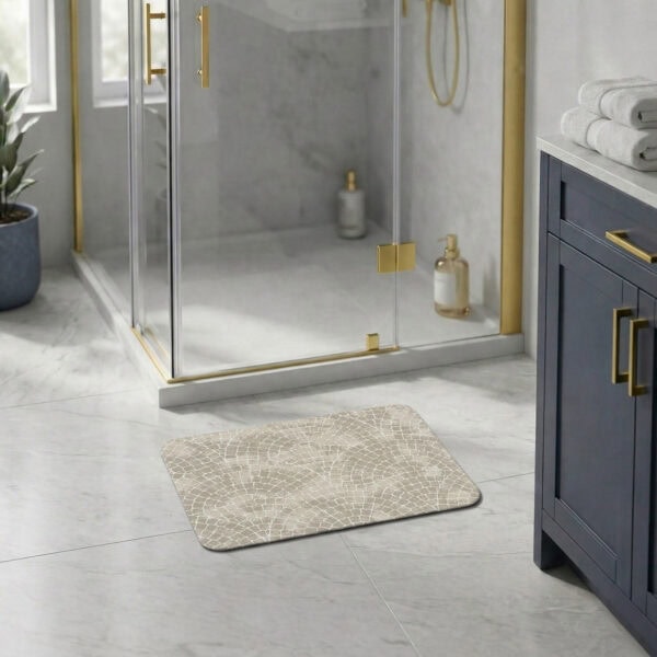 Mosaic Stone bath mat in modern bathroom with glass shower and navy vanity