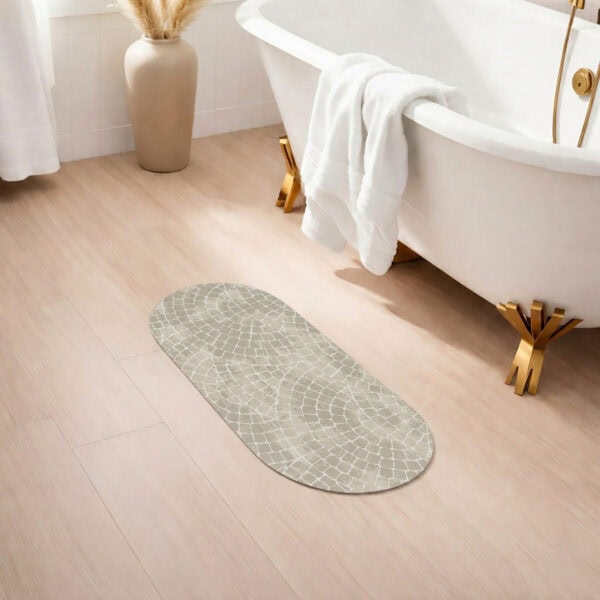 Mosaic Stone bath mat runner in spa bathroom with clawfoot tub and gold accents