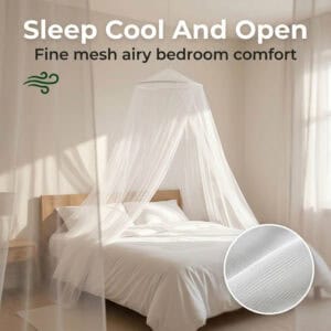 White dome mosquito net canopy over double bed showing fine breathable polyester mesh close-up