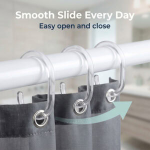 Transparent curtain hooks sliding along rod with hand pulling curtain demonstrating easy movement
