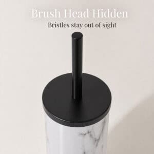 Marble toilet brush holder with the black lid closed and only the handle showing, keeping the bristles hidden and out of sight inside the canister.