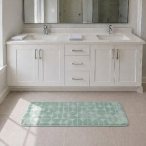 Sage green long narrow bathroom runner placed in front of a modern double vanity with white shaker cabinetry, fresh and welcoming family bathroom setting