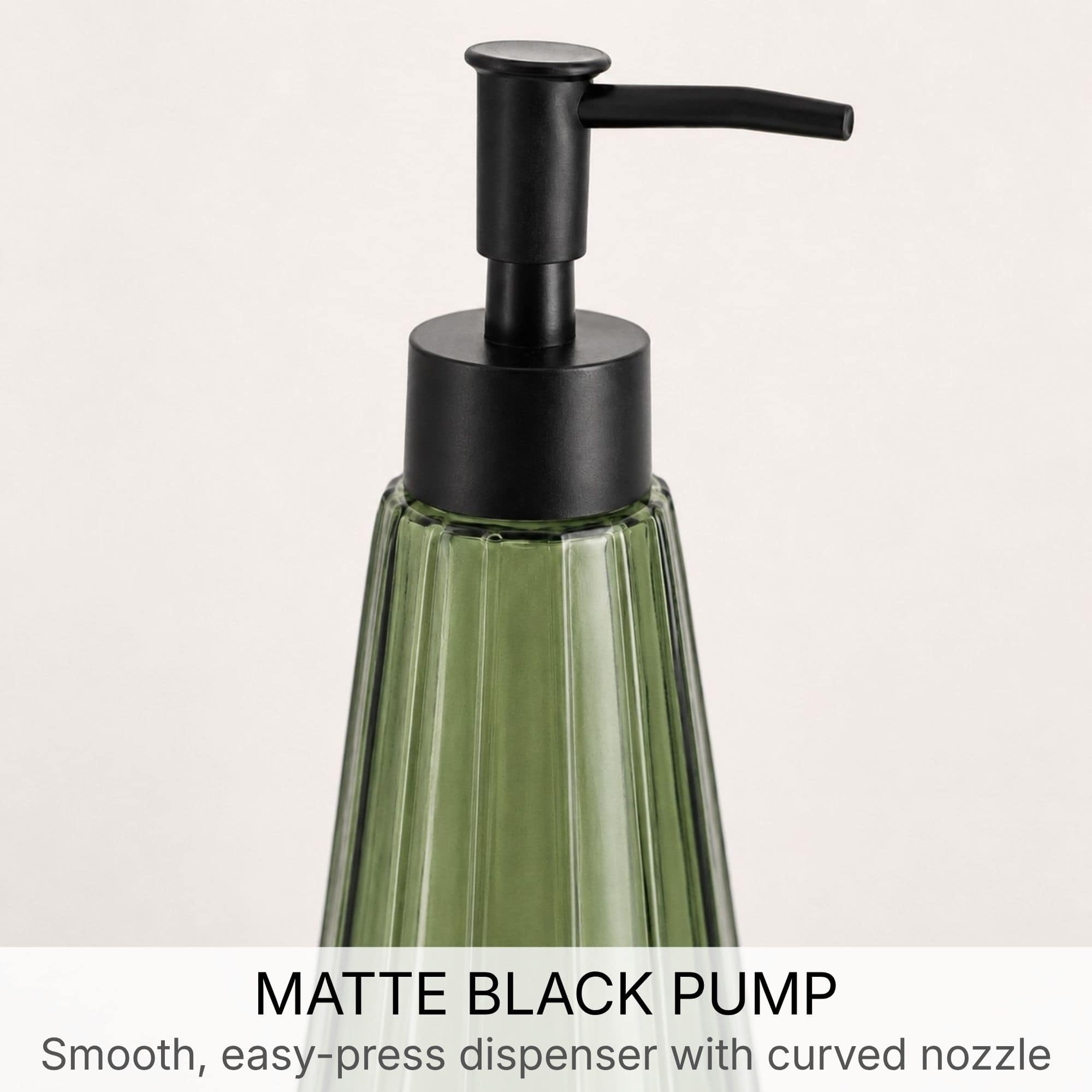Close-up of the matte black pump on the olive green glass soap dispenser with curved nozzle for easy dispensing
