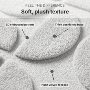 Plush velvet-feel memory foam bath rug close-up showing 3D embossed half-circle pattern and thick cushioned base.