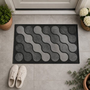Gray ripple pattern outdoor rubber doormat at residential front door entrance, decorated with potted plants, hydrangeas and sneakers, welcoming home entryway top down view