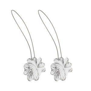 01 (set-of-2 packshot): Set of two distressed white and black metal flower curtain tiebacks with thin silver cable loops, shown against a plain background to highlight the carved petal detail.