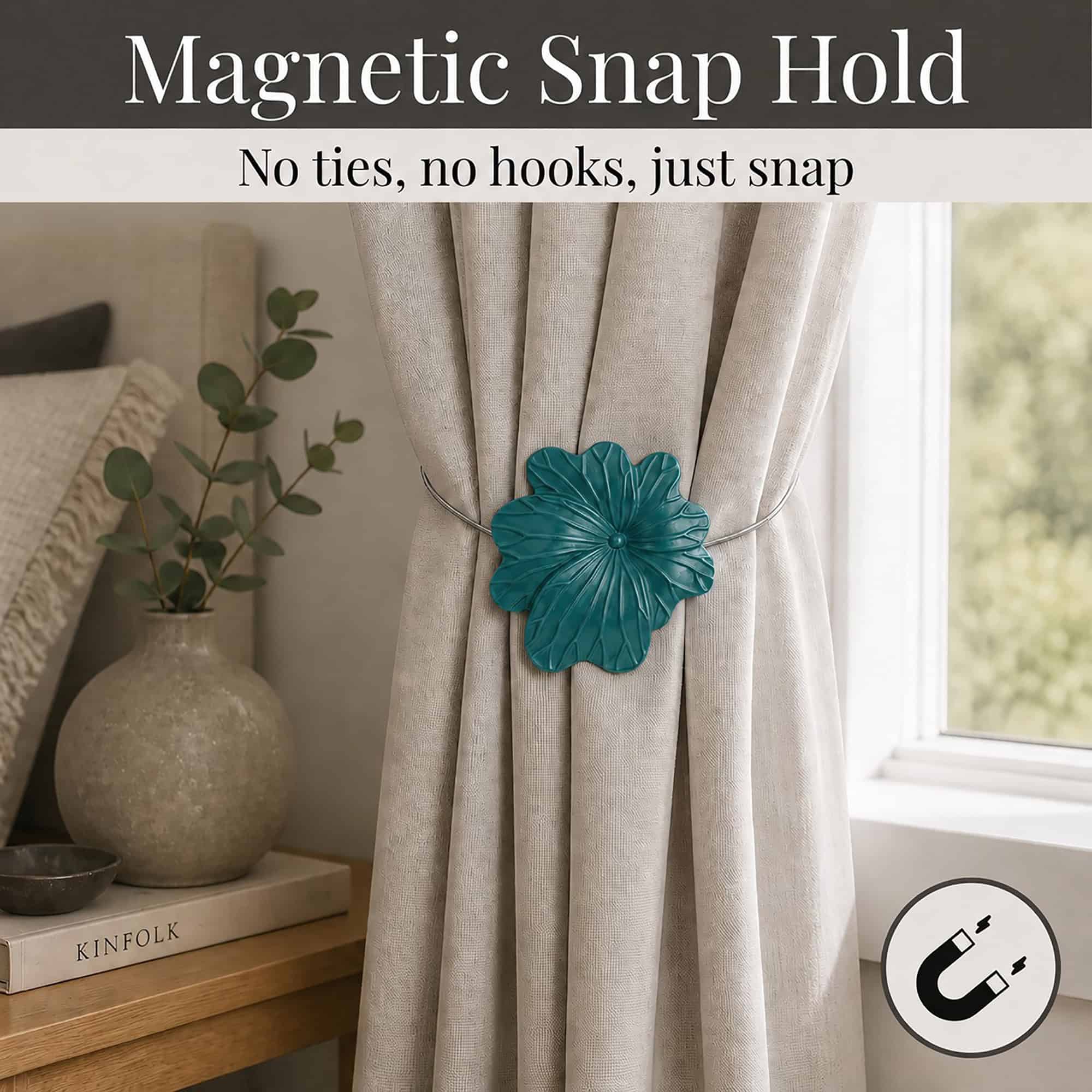 02 (magnetic snap hold): Dark green flower tieback holding a gathered oatmeal linen curtain beside a styled nightstand, its magnetic ends snapping shut with no ties or hooks needed.