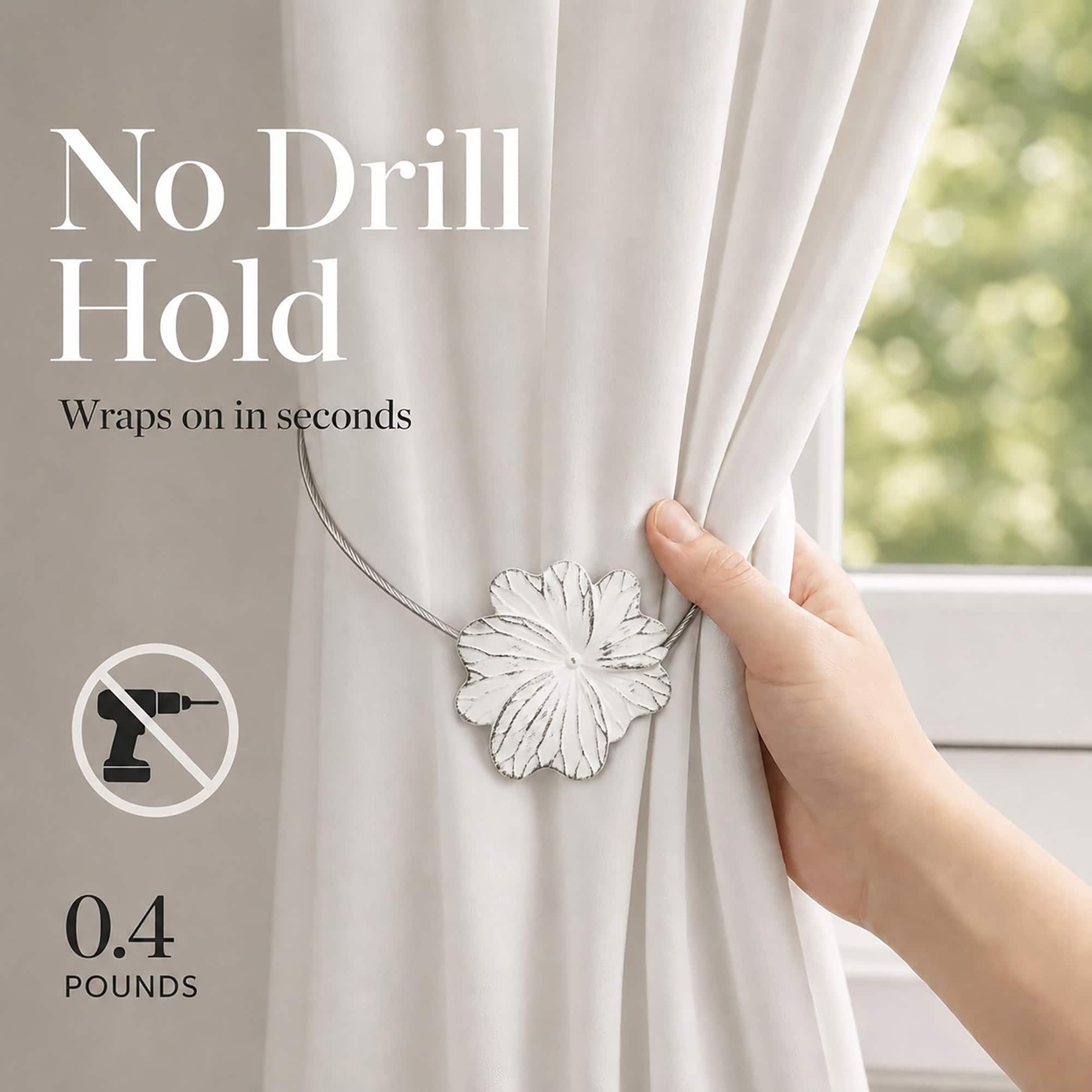 03 (no drill hold): A hand gathers a cream curtain held by the lightweight flower tieback, which weighs about zero point four pounds and needs no drilling to install.