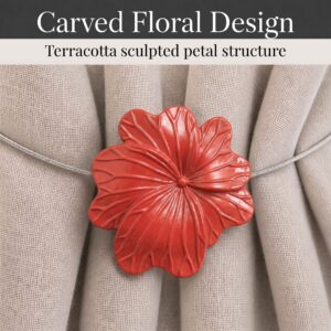 05 (carved floral design): Close up of the flower face revealing sculpted petals in glossy terracotta with carved veins radiating across the raised center of each bloom.