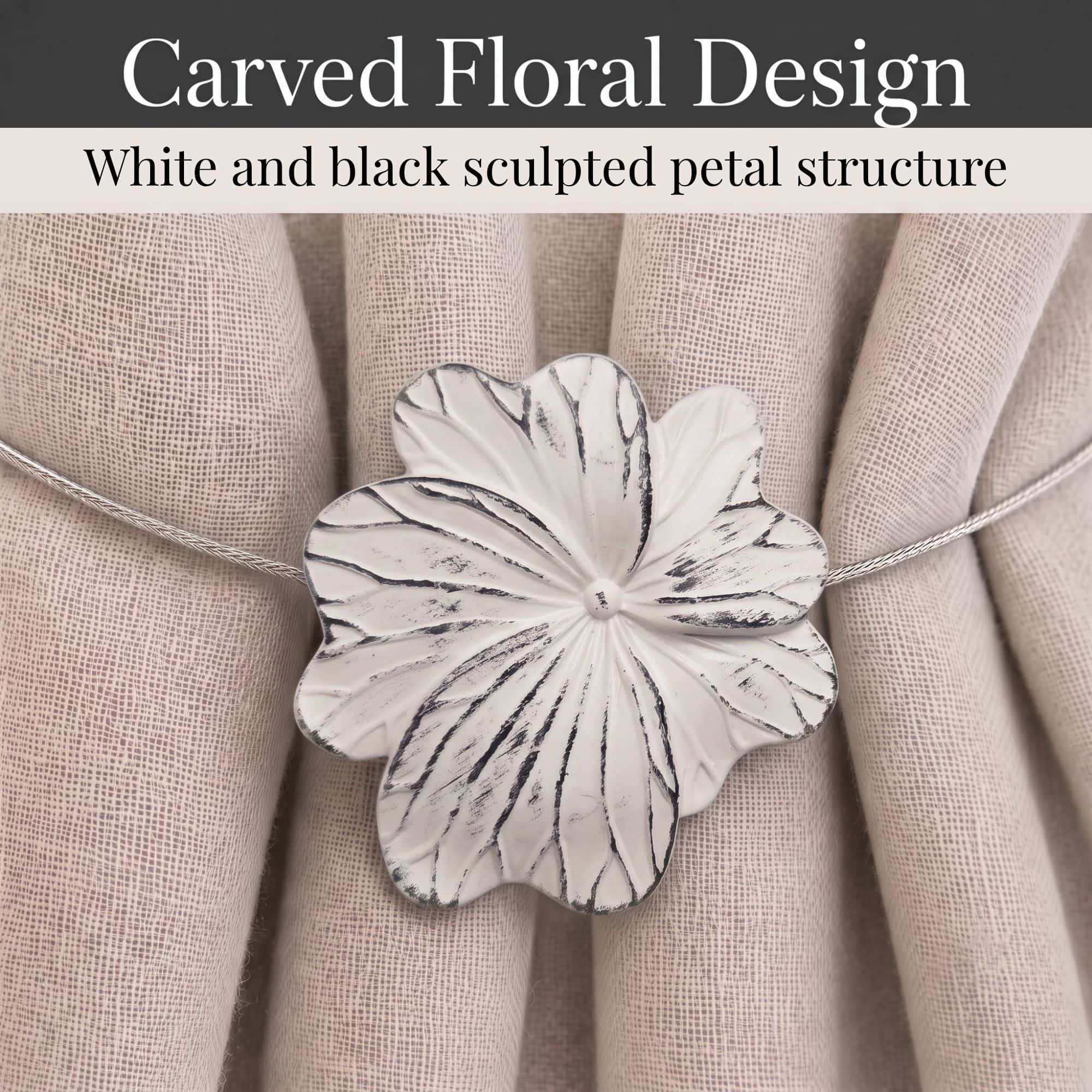 05 (carved floral design): Close up of the flower face revealing carved petals in distressed white with black brushed accents that trace each vein across the sculpted surface.