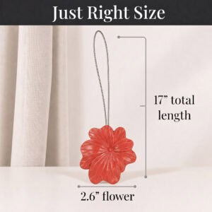 06 (just right size): Size reference for the tieback, showing a cable and flower measuring seventeen inches in total length with the flower head spanning two point six inches across.