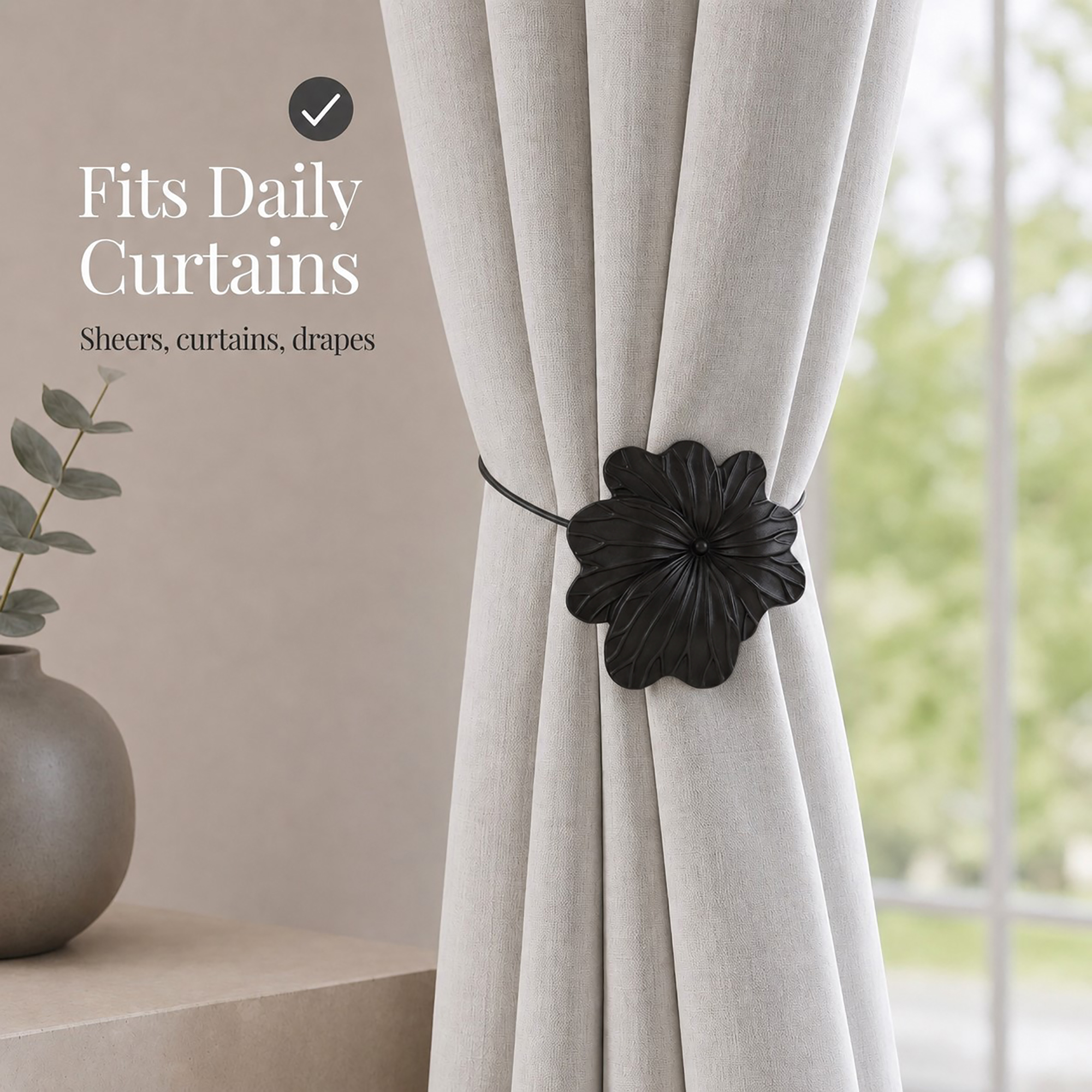 07 (fits daily curtains): Matte black flower tieback gathering a greige linen curtain by a window, suited to everyday sheers, curtains, and drapes in a calm neutral setting.