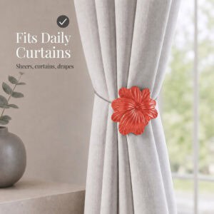 07 (fits daily curtains): Terracotta flower tieback gathering a greige linen curtain by a window, suited to everyday sheers, curtains, and drapes in a calm neutral setting.