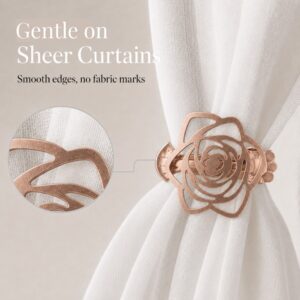 Close-up graphic demonstrating a copper curtain clip holding a sheer fabric panel. An inset circular zoom highlights the smooth, rounded metal edges of the rose design, with text reading "Gentle on Sheer Curtains: Smooth edges, no fabric marks".