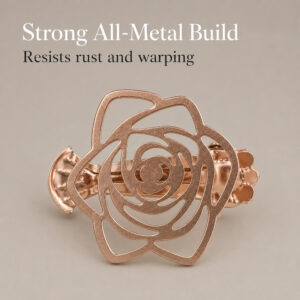 Front view of a single copper-colored metal curtain tieback clip shaped like a rose flower against a plain gray background. Text above reads "Strong All-Metal Build: Resists rust and warping".