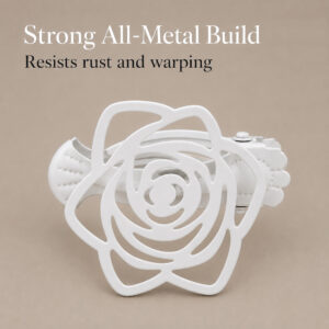 A close-up shot of the white metal rose curtain clip on a neutral background, highlighting the text "Strong All-Metal Build. Resists rust and warping."