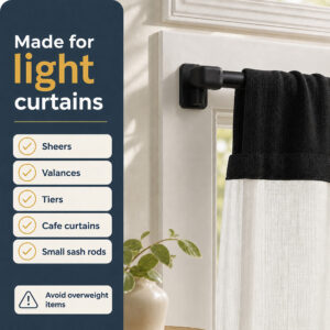 Black adhesive sash rod brackets holding a sheer cafe tier curtain and valance on a kitchen window