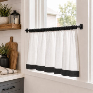 Farmhouse kitchen window with cafe curtain hung on black self adhesive rod hooks